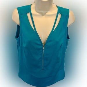 bebe XS sleeveless Turquoise top with cutouts and zip front/elastic waist back.